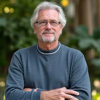 Portrait of Marcus Thorne, a mind-body coach and mindfulness instructor, in a contemplative pose.
